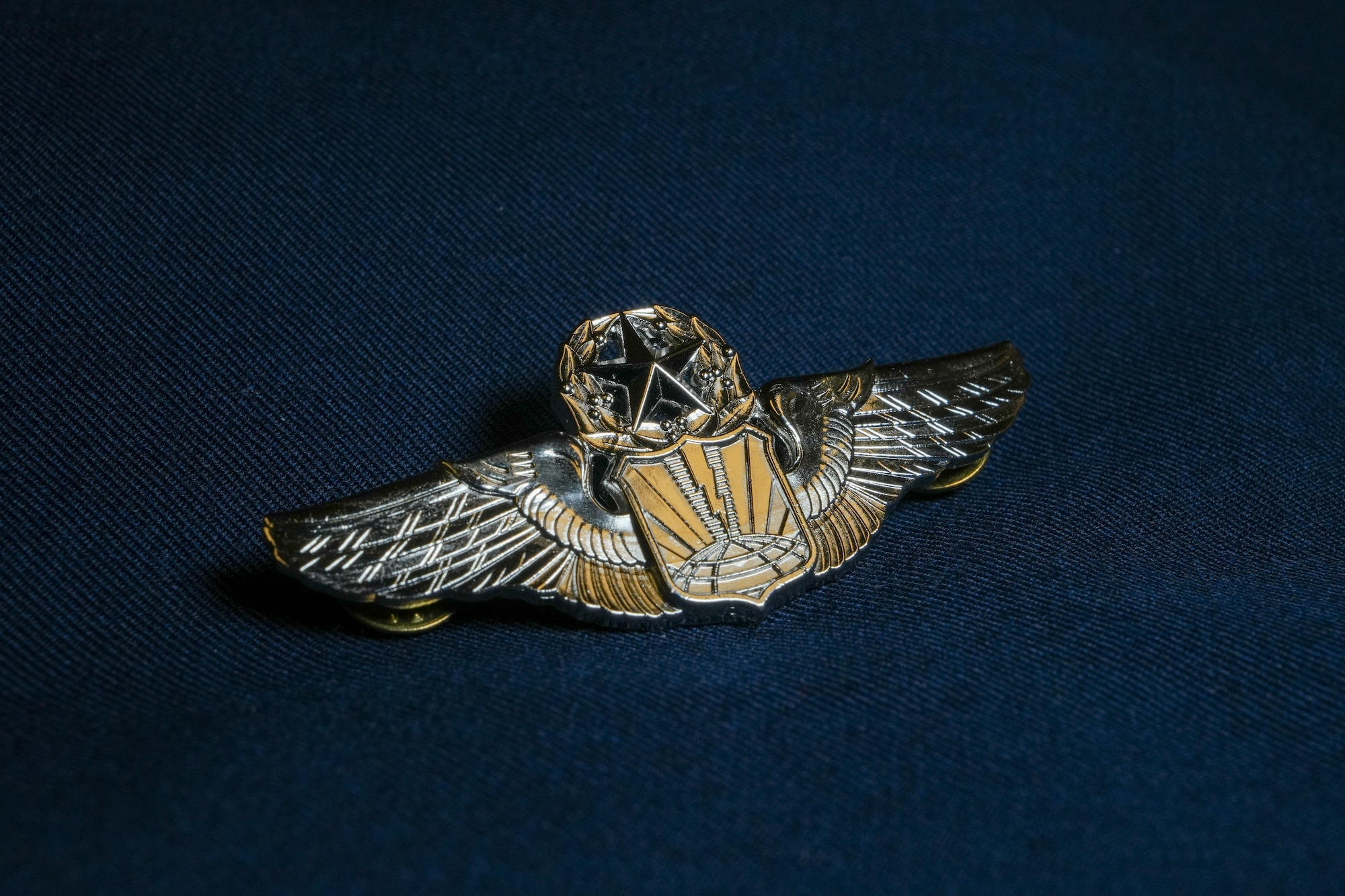 A pair of command pilots sits on a table.