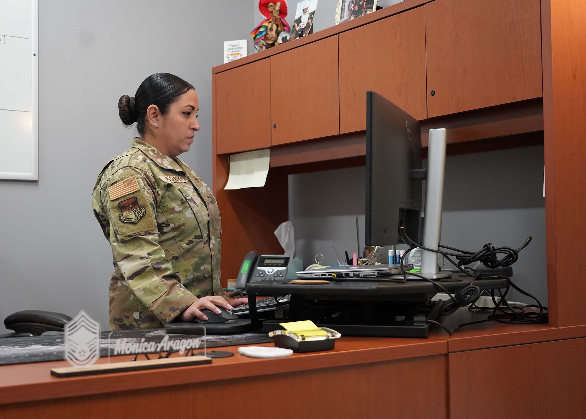 Maryland Air National Guard Chief Master Sgt. Monica Aragon, senior enlisted advisor to the Joint Staff, performs work at her computer at Camp Fretterd Military Reservation, Reisterstown, Maryland, December 10, 2025. Aragon was selected to be the first Airman to hold the role of senior enlisted advisor to the Joint Staff in Maryland National Guard history. (U.S. Army photo by Capt. Dylan Bradford)