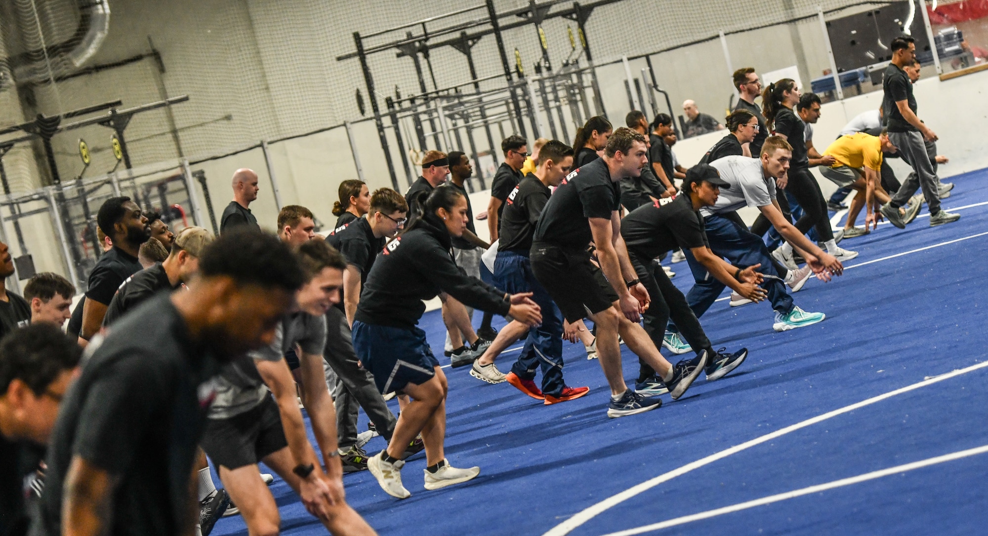 Members of the 55th Logistics Readiness Squadron participate in group physical training on December 12, 2025 at the Offutt Field House. The LRS regularly holds squadron PT sessions. (U.S. Air Force photo by Chad Watkins)