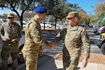 U.S. Air Force Lt. Gen. Thomas Hensley (right), Sixteenth Air Force (Air Forces Cyber) commander, greets Polish Maj. Gen. Karol Molenda, commander of Polish Cyber Command, before their key leader engagement at Joint Base San Antonio–Lackland, Texas, Dec. 10, 2025. Fourteen Polish Cyber Command delegates visited Sixteenth Air Force, the Air Force’s cyber component, for a key leader engagement and technical exchange to expand bilateral cyber defense efforts. (U.S. Air Force photo by Matthew McGovern)