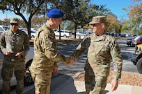 Sixteenth Air Force commander greets Polish Cyber Commander.