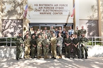 Sixteenth Air Force and Polish Cyber Command leadership pose for a group photo.