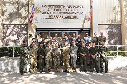 Sixteenth Air Force and Polish Cyber Command leadership pose for a group photo.