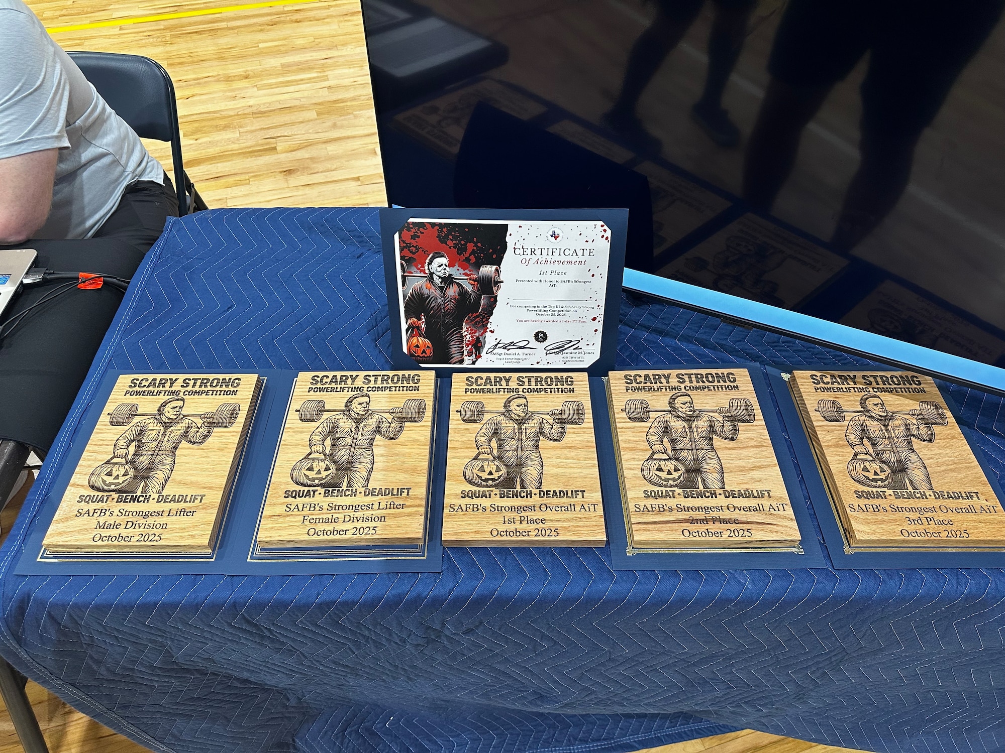 U.S. Air Force Ret. Master Sgt. John Cooper, a civilian with the 82nd Training Wing, designed and crafted the plaques for the event’s winners at the 2025 Scary Strong Powerlifting Competition held at Sheppard Air Force Base, Texas, Oct. 25, 2025.