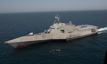 CENTRAL COMMAND AREA OF RESPONSIBILITY – The littoral combat ship USS Canberra (LCS 30) entered the U.S. Central Command area of responsibility on May 26, 2025. As an Independence variant of the LCS, Canberra is deployed in the region to enhance maritime security in the Middle East. Since 2014, the Battle Management System has been involved in developing the fire control hardware and software for the Hellfire Longbow, which is part of the LCS surface-to-surface missile module. (U.S. Navy Photo by Chief Petty Officer Christopher Krucke)