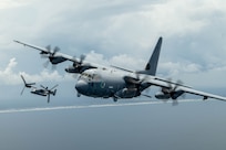 HURLBURT FIELD, Fla. – On June 6, 2025, an AC-130J Ghostrider gunship and a CV-22 Osprey, both assigned to the Air Force Special Operations Command, flew over the Gulf of Mexico near Hurlburt Field, Florida. The AC-130J is equipped with a precision strike package that includes a mission management console, a robust communications suite, advanced fire control equipment, the capability for precision-guided munitions delivery and trainable 30mm and 105 mm weaponry. (U.S. Air Force Photo by Airman 1st Class Tori Haudenschild)
