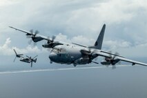 HURLBURT FIELD, Fla. – On June 6, 2025, an AC-130J Ghostrider gunship and a CV-22 Osprey, both assigned to the Air Force Special Operations Command, flew over the Gulf of Mexico near Hurlburt Field, Florida. The AC-130J is equipped with a precision strike package that includes a mission management console, a robust communications suite, advanced fire control equipment, the capability for precision-guided munitions delivery and trainable 30mm and 105 mm weaponry. (U.S. Air Force Photo by Airman 1st Class Tori Haudenschild)