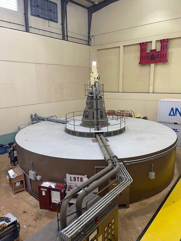 A hydropower unit inside the Old Hickory Powerhouse is poised to provide rapid-response electricity, Friday, Dec. 12, 2025. Unlike large thermal plants that can take hours to start, hydropower units like this generate power in under 10 minutes to ensure grid stability during periods of high demand. (photo by Chris Campbell, U.S. Army Corps of Engineers Plant Operator)