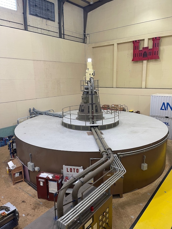 A hydropower unit inside the Old Hickory Powerhouse is poised to provide rapid-response electricity, Friday, Dec. 12, 2025. Unlike large thermal plants that can take hours to start, hydropower units like this generate power in under 10 minutes to ensure grid stability during periods of high demand. (photo by Chris Campbell, U.S. Army Corps of Engineers Plant Operator)