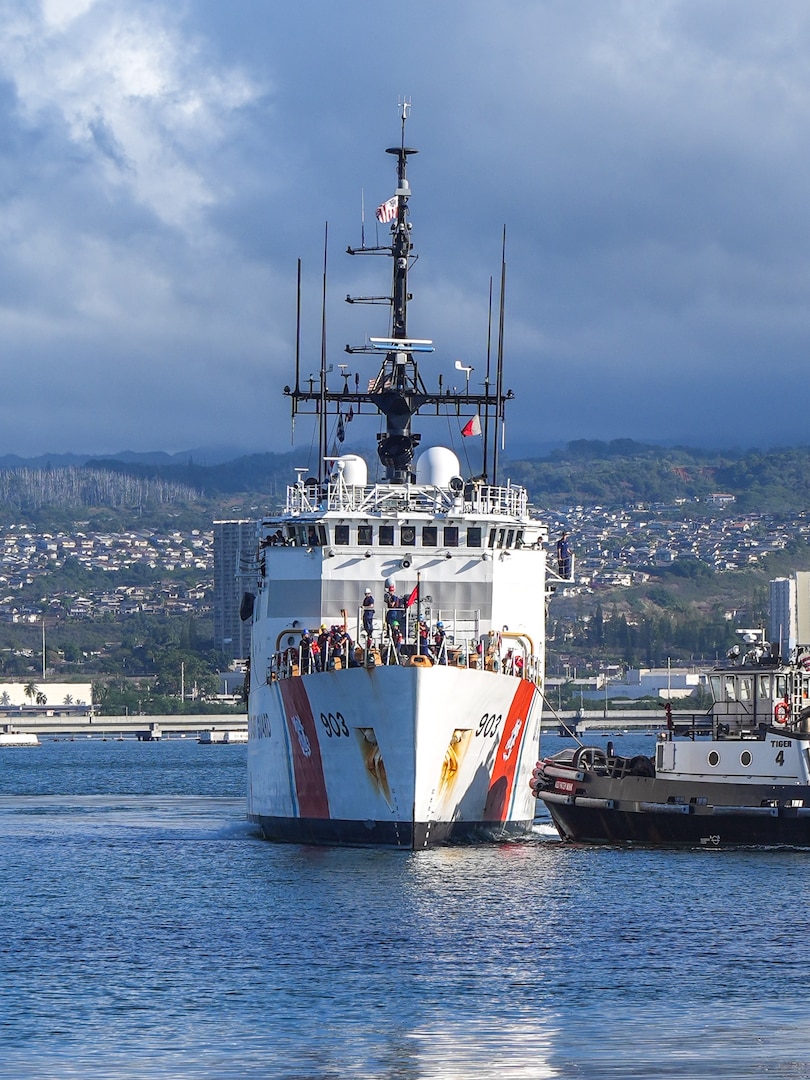 U.S. Coast Guardsmen assigned to the medium endurance cutter USCGC Harriet Lane (WMEC 903) prepare to moor at Joint Base Pearl Harbor-Hickam in Honolulu Oct. 6, 2025. During their 81-day deployment, the crew patrolled more than 16,000 nautical miles, conducting joint operations and territorial integrity missions across Oceania. (U.S. Coast Guard photo by Petty Officer 3rd Class Jennifer Nilson)