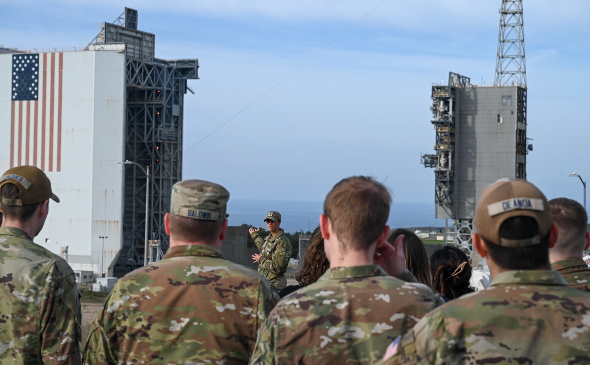 U.S. Space Force 1st Lt. Anna Ford, 2nd Space Launch Squadron responsible engineer, explains the functions of Space Launch Complex 6 to a Guardian Nexus Tour group.