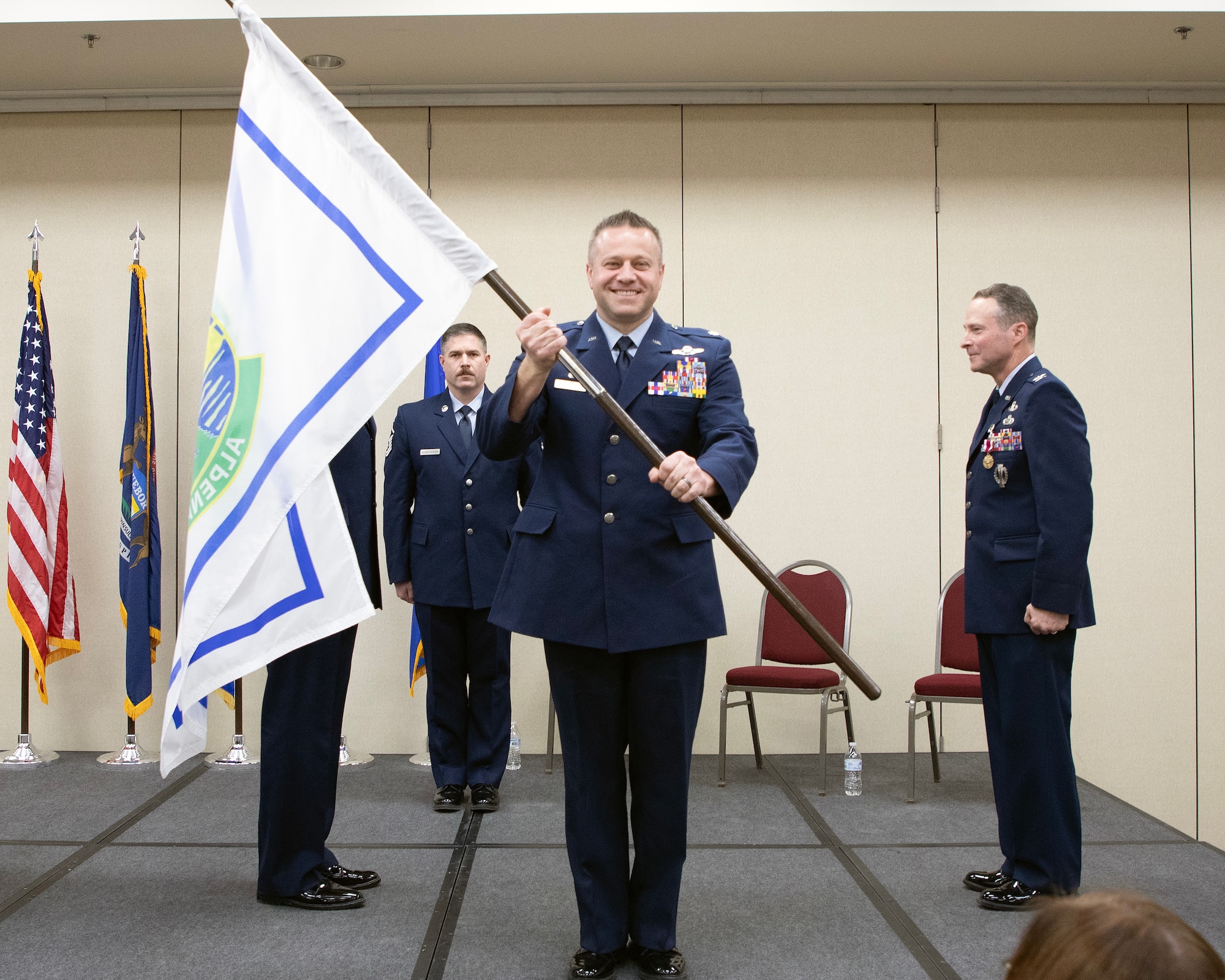 Air Force officer presents flag