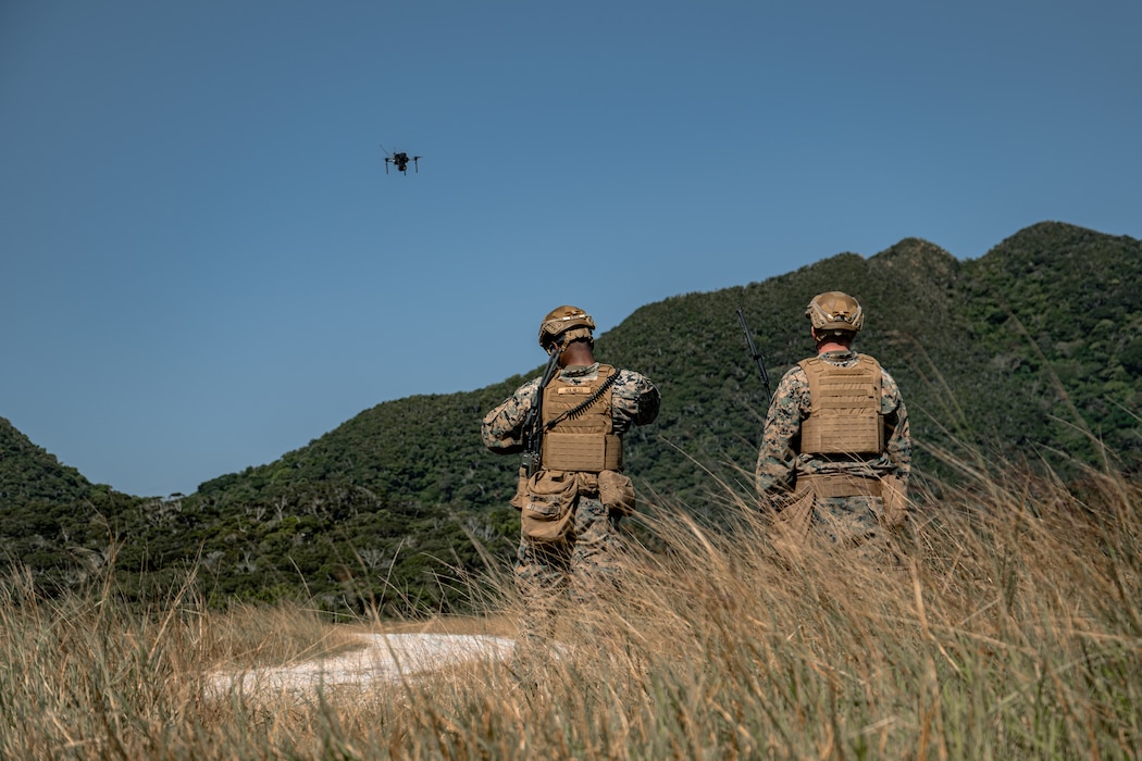 U.S. Marines with III Marine Expeditionary Force prepare to receive a drone during the Marine Corps Attack Drone Competition on Camp Schwab, Okinawa, Japan, Dec. 9, 2025.