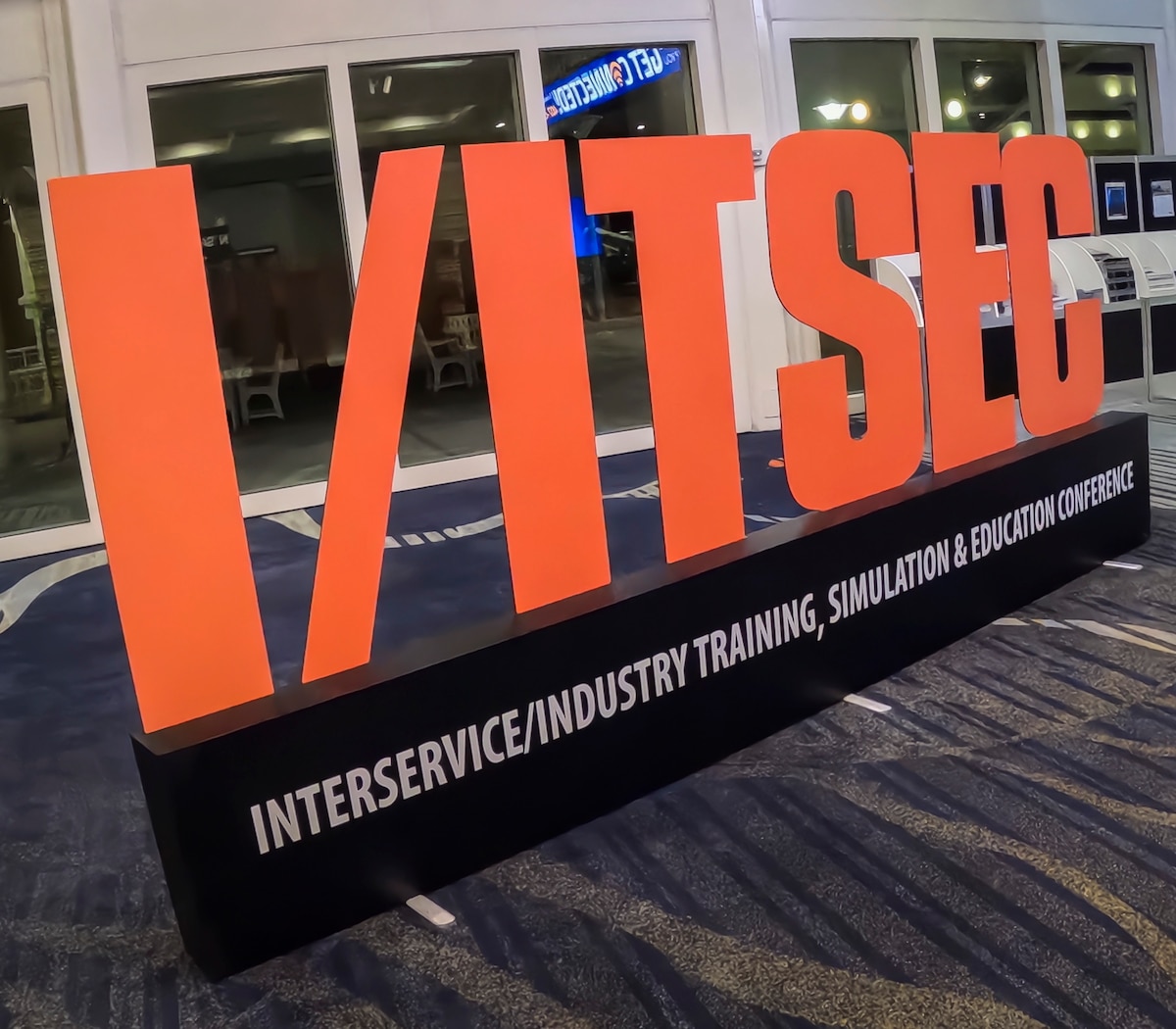 Image is a sign that says I/ITSEC