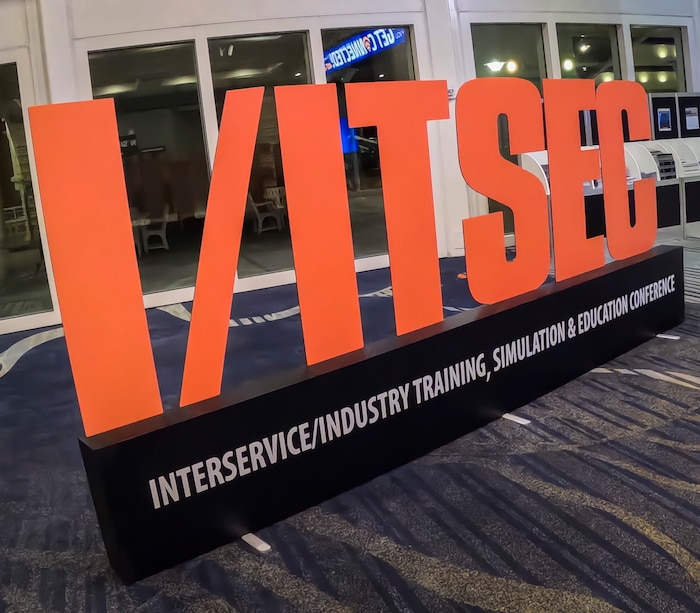 Image is a sign that says I/ITSEC