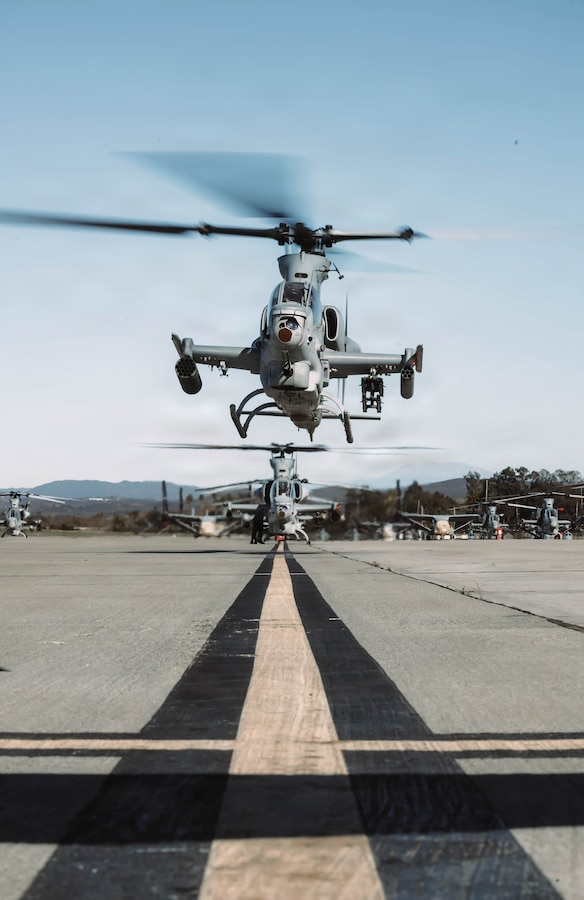 U.S. Marine Corps AH-1Z Viper aircraft with Marine Light Attack Helicopter Squadron (HMLA) 267, Marine Aircraft Group 39, 3rd Marine Aircraft Wing, taxi down runway for a Close Air Support mission during Steel Knight 25 at Marine Corps Air Station Camp Pendleton, California, Dec. 4, 2025. CAS employment demonstrates 3rd MAW’s ability to deliver timely, precise fires that enable the Marine Air-Ground Task Force to maneuver effectively across distributed and contested environments. Steel Knight is an annual exercise that strengthens the Navy-Marine Corps team's ability to respond forward, integrate across domains, and sustain MAGTF readiness. (U.S. Marine Corps photo by Sgt. Brian A. Stippey)