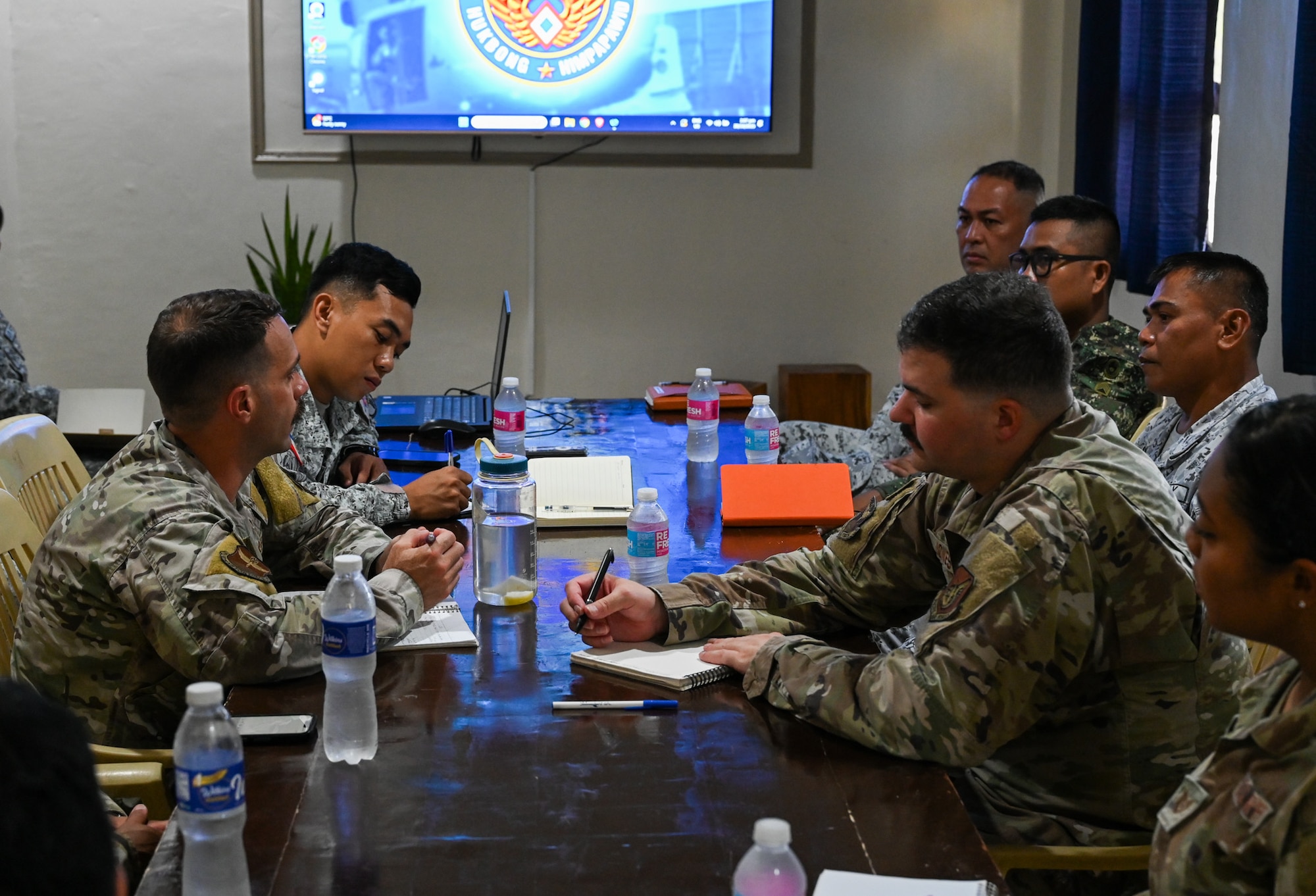 U.S. Air Force Airmen from the 11th Air Task Force meet with Philippines Air Force members to discuss subject matter expert information exchanges at Antonio Bautista Air Base, Philippines, Oct. 20, 2025.