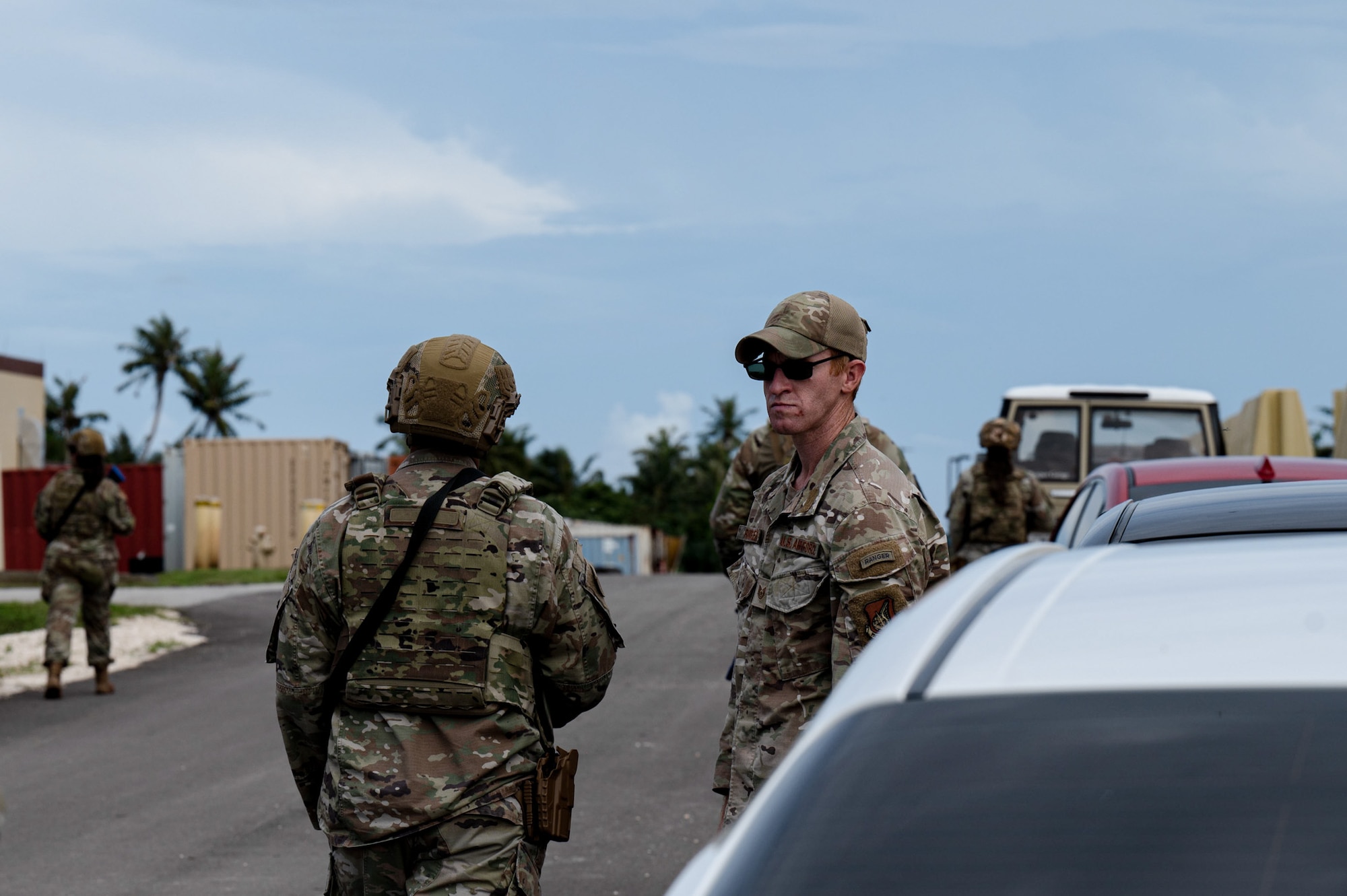 A U.S. Air Force Airman from the 824th Base Defense Squadron, signals his team to begin tactical movement formation at Andersen Air Force Base, Guam, Oct. 21, 2025.