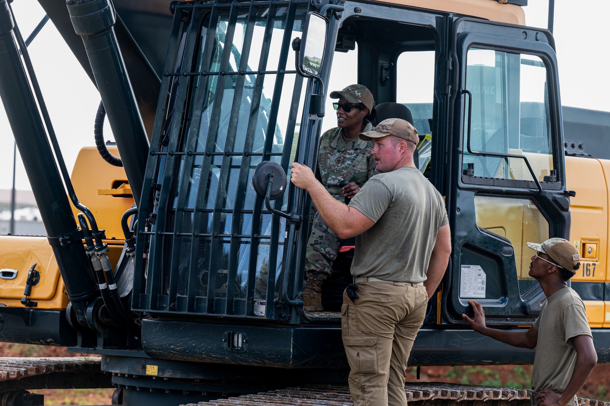 U.S. Air Force Chief Master Sgt. Sharreen Taylor, 11th Air Task Force command chief, tours heavy machinery and meets with the civil engineering operators taking part in the groundbreaking labor at Andersen Air Force Base on Nov. 17, 2025.