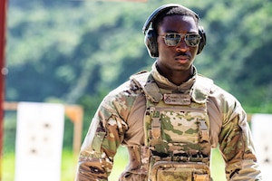A U.S. Air Force Airman from the 11th Combat Air Base Squadron, returns from reviewing his target at Andersen Air Force Base, Guam, Nov. 14, 2025.