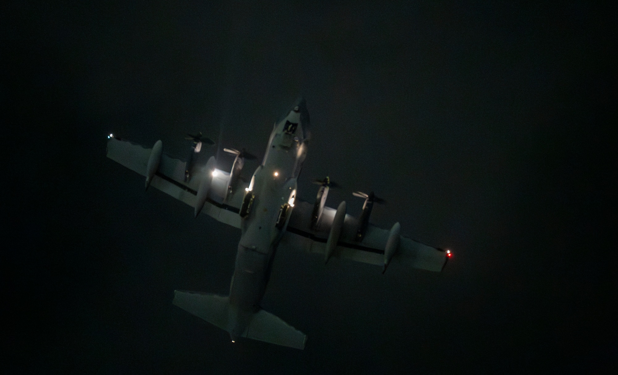 A U.S. Air Force C-130J Super Hercules assigned to the 353rd Special Operations Wing flies over Kadena Air Base, Japan, Dec. 11, 2025.