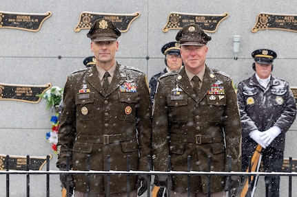Maj. Gen. Lawrence "Larry" Muennich, Indiana National Guard adjutant general, left, and Command Sgt. Maj. Joshua A. Brown, Indiana National Guard state command sergeant major, pose for a photo at Crown Hill Cemetery in Indianapolis Dec. 13, 2025. Muennich and Brown joined Indiana military and civic leaders, veteran and patriotic organizations, and members of the public to place wreaths on the graves of veterans in the cemetery as part of a Wreaths Across America event. (U.S. Army photo by Mark R. W. Orders-Woempner)