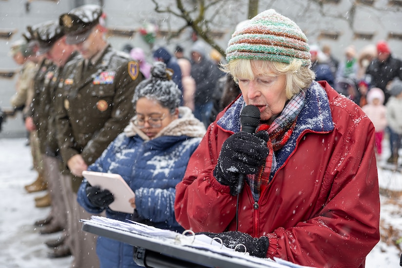 Margaret Smith, Daughters of the American Revolution Caroline Scott Harrison Chapter chaplain, prays during a Wreaths Across America event at Crown Hill Cemetery in Indianapolis Dec. 13, 2025. This year, more than two million volunteers and supporters gathered to remember, honor and teach by laying wreaths on the graves of veterans at more than 5,200 participating locations in all 50 states, at sea and abroad. (U.S. Army photo by Mark R. W. Orders-Woempner)