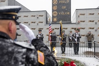 Members of the Indy Metropolitan Military Honor Guard present the Colors during a Wreaths Across America event at Crown Hill Cemetery in Indianapolis Dec. 13, 2025. This year, more than two million volunteers and supporters gathered to remember, honor and teach by laying wreaths on the graves of veterans at more than 5,200 participating locations in all 50 states, at sea and abroad. (U.S. Army photo by Mark R. W. Orders-Woempner)