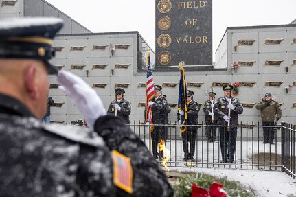 Members of the Indy Metropolitan Military Honor Guard present the Colors during a Wreaths Across America event at Crown Hill Cemetery in Indianapolis Dec. 13, 2025. This year, more than two million volunteers and supporters gathered to remember, honor and teach by laying wreaths on the graves of veterans at more than 5,200 participating locations in all 50 states, at sea and abroad. (U.S. Army photo by Mark R. W. Orders-Woempner)