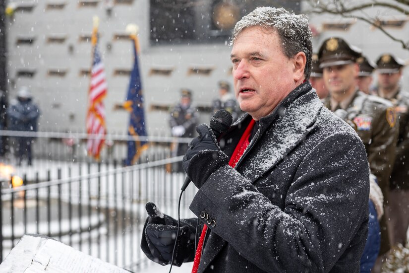 Indiana Attorney General Todd Rokita delivers remarks during a Wreaths Across America event at Crown Hill Cemetery in Indianapolis Dec. 13, 2025. This year, more than two million volunteers and supporters gathered to remember, honor and teach by laying wreaths on the graves of veterans at more than 5,200 participating locations in all 50 states, at sea and abroad. (U.S. Army photo by Mark R. W. Orders-Woempner)