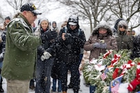 Retired U.S. Army Sgt. Maj. Bruce Paul, who served as a finance Soldier, salutes a wreath representing the Army, during a Wreaths Across America event at Crown Hill Cemetery in Indianapolis Dec. 13, 2025. This year, more than two million volunteers and supporters gathered to remember, honor and teach by laying wreaths on the graves of veterans at more than 5,200 participating locations in all 50 states, at sea and abroad. (U.S. Army photo by Mark R. W. Orders-Woempner)