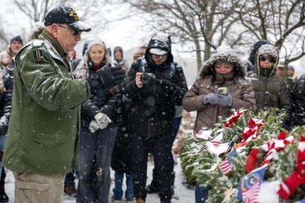 Retired U.S. Army Sgt. Maj. Bruce Paul, who served as a finance Soldier, salutes a wreath representing the Army, during a Wreaths Across America event at Crown Hill Cemetery in Indianapolis Dec. 13, 2025. This year, more than two million volunteers and supporters gathered to remember, honor and teach by laying wreaths on the graves of veterans at more than 5,200 participating locations in all 50 states, at sea and abroad. (U.S. Army photo by Mark R. W. Orders-Woempner)
