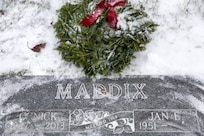 The grave of C. Nick Maddix, a U.S. Army Vietnam War veteran who passed in 2013, is pictured during a Wreaths Across America event at Crown Hill Cemetery in Indianapolis Dec. 13, 2025. This year, more than two million volunteers and supporters gathered to remember, honor and teach by laying wreaths on the graves of veterans at more than 5,200 participating locations in all 50 states, at sea and abroad. (U.S. Army photo by Mark R. W. Orders-Woempner)