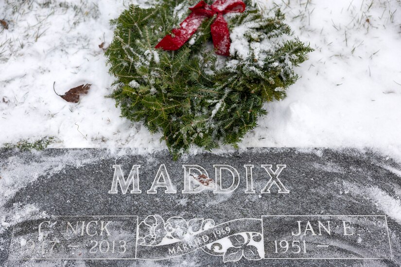 The grave of C. Nick Maddix, a U.S. Army Vietnam War veteran who passed in 2013, is pictured during a Wreaths Across America event at Crown Hill Cemetery in Indianapolis Dec. 13, 2025. This year, more than two million volunteers and supporters gathered to remember, honor and teach by laying wreaths on the graves of veterans at more than 5,200 participating locations in all 50 states, at sea and abroad. (U.S. Army photo by Mark R. W. Orders-Woempner)
