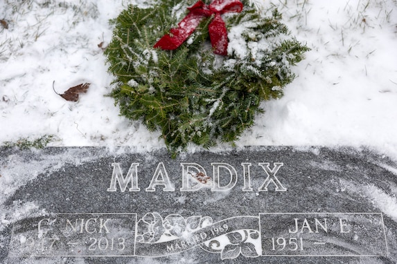 The grave of C. Nick Maddix, a U.S. Army Vietnam War veteran who passed in 2013, is pictured during a Wreaths Across America event at Crown Hill Cemetery in Indianapolis Dec. 13, 2025. This year, more than two million volunteers and supporters gathered to remember, honor and teach by laying wreaths on the graves of veterans at more than 5,200 participating locations in all 50 states, at sea and abroad. (U.S. Army photo by Mark R. W. Orders-Woempner)