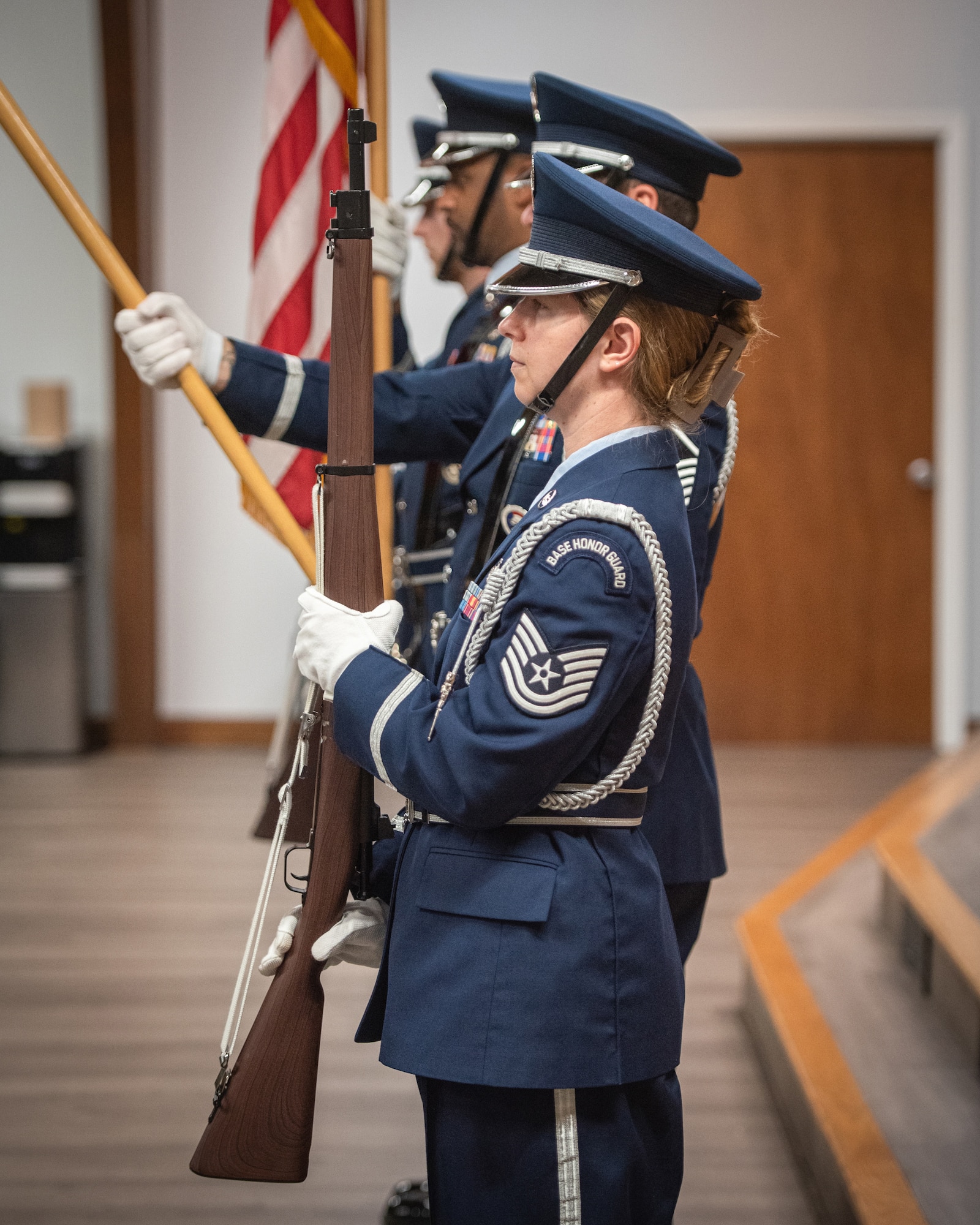 The 123rd Airlift Wing Honor Guard presents the colors during a retirement ceremony at the Kentucky Air National Guard Base in Louisville, Ky., Sept. 7, 2025, for Chief Master Sgt. Krome Raymond, 123rd Mission Support Group senior enlisted leader. Raymond served 22 years in both the active-duty Air Force and Kentucky Air Guard during three periods of enlistment spread over 38 years. (U.S. Air National Guard photo by Senior Airman Annaliese Billings)
