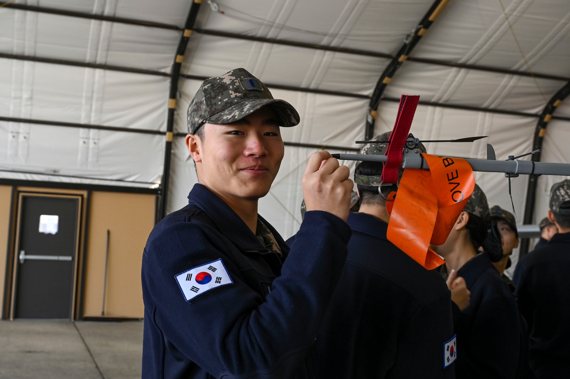A man touches a plane.