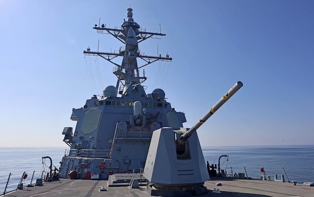 GULF OF OMAN (Dec. 11, 2025) The Arleigh Burke-class guided-missile destroyer USS Roosevelt (DDG 80) sails in the Gulf of Oman while operating in the U.S. Central Command (CENTCOM) area of responsibility. Roosevelt is deployed to the U.S. 5th Fleet area of operations to support maritime security and stability in the CENTCOM area of responsibility. (U.S. Navy photo by Mass Communication Specialist 1st Class Indra Beaufort)