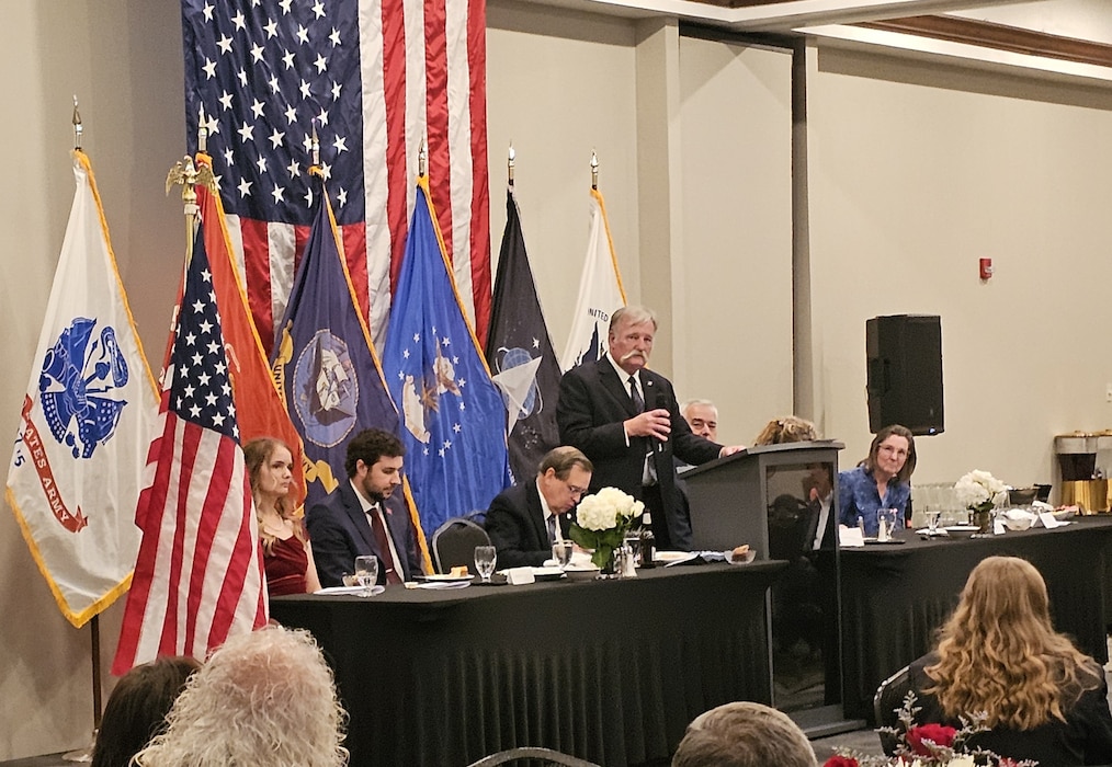 Dave Duesterhaus, addresses attendees of the annual Arnold Community Council banquet following his induction as an AEDC Fellow during the recent event. Duesterhaus, selected as an AEDC Lifetime Achievement Fellow, was recognized for his efforts in leading the Technology Division, Director of the AEDC National Full-Scale Aerodynamics Complex, and Ground Test Representative for the Director of Operational Test and Evaluation. Duesterhaus was one of three Fellows inducted during the banquet. The AEDC Fellows program, established in 1989, recognizes AEDC personnel who have made substantial and exceptionally distinguished contributions to the nation’s aerospace ground testing capability. (Courtesy photo)