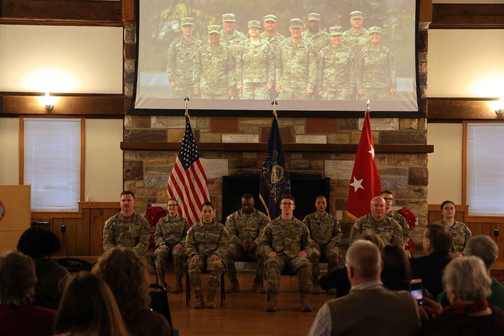 U.S. Soldiers with the 109th Mobile Public Affairs Detachment, 213th Regional Support Group, Pennsylvania Army National Guard are honored during a departure ceremony at the Keystone Conference Center at Fort Indiantown Gap, Pennsylvania, Dec. 13, 2025.