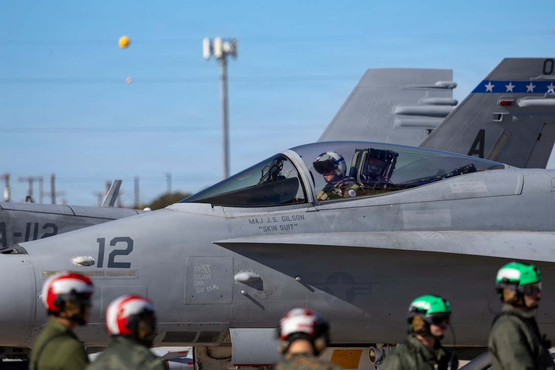 A U.S. Marine Corps F/A-18C Hornet aircraft with Marine Fighter Attack Squadron (VMFA) 112, Marine Aircraft Group 41, 4th Marine Aircraft Wing, prepares for take-off to conduct close air support training at Naval Air Station Joint Reserve Base Fort Worth, Texas, Dec. 9, 2025. The training serves to increase proficiency, validate ordinance handling procedures, and support joint fire support elements. (U.S. Marine Corps photo by Staff Sgt. Ethan M. LeBlanc)