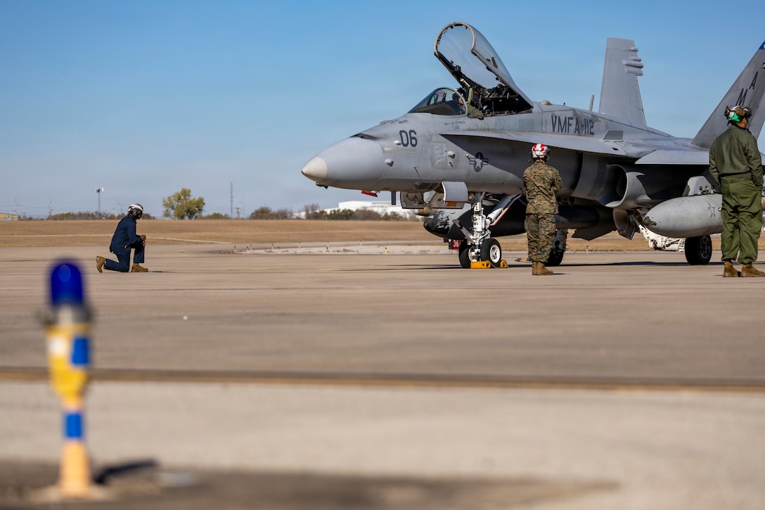 A U.S. Marine Corps F/A-18C Hornet aircraft with Marine Fighter Attack Squadron (VMFA) 112, Marine Aircraft Group 41, 4th Marine Aircraft Wing, prepares for take-off to conduct close air support training at Naval Air Station Joint Reserve Base Fort Worth, Texas, Dec. 9, 2025. The training serves to increase proficiency, validate ordinance handling procedures, and support joint fire support elements. (U.S. Marine Corps photo by Staff Sgt. Ethan M. LeBlanc)