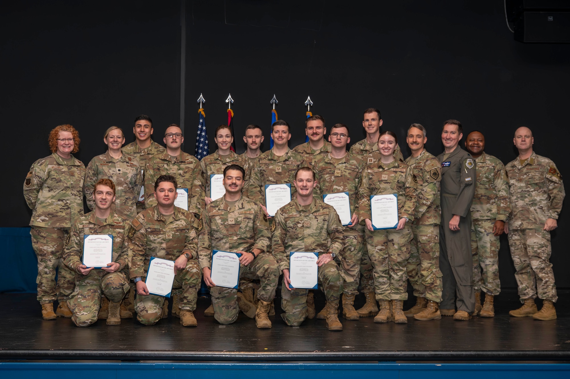 Gallant Unit Citation recipients pose for a photo with 86th Airlift Wing leadership following a Gallant Unit Citation ceremony at Ramstein Air Base, Germany, Dec. 5, 2025.