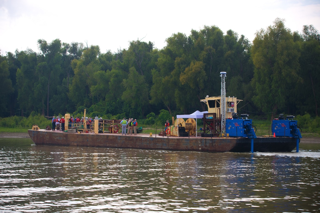 A barge floating in the river.