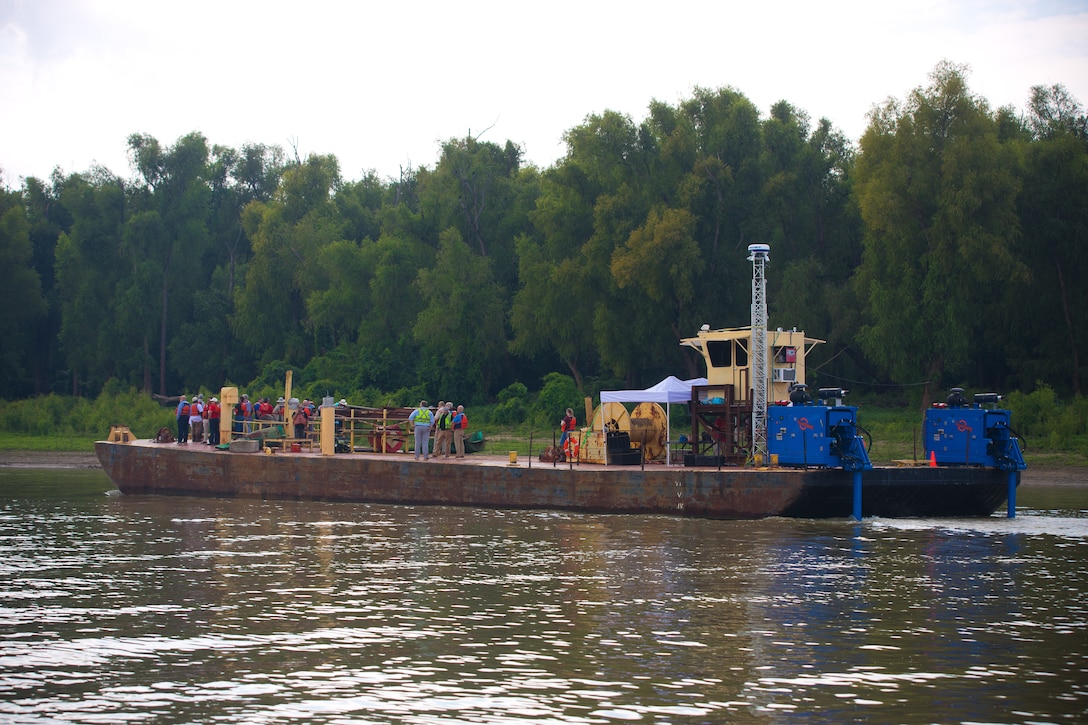 A barge floating in the river.