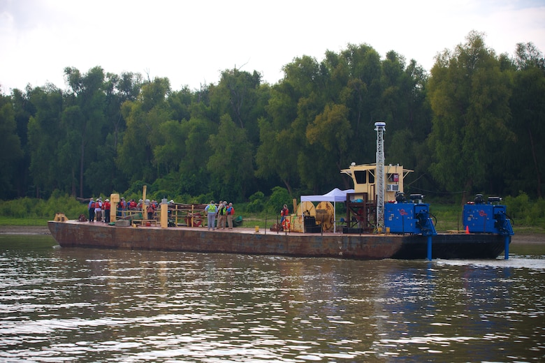 A barge floating in the river.