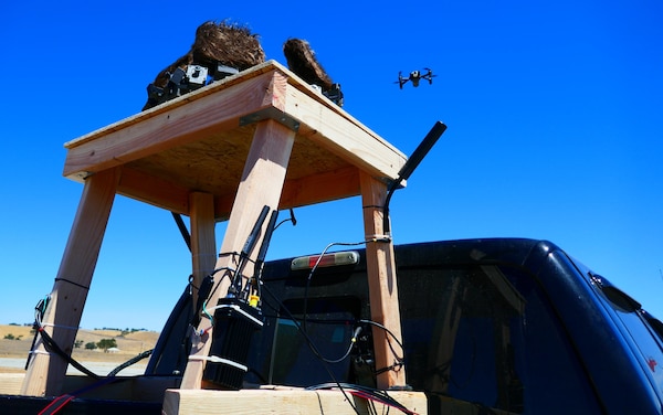 CAMP ROBERTS, Calif. (Sep. 9, 2025) From the bed of a pickup truck, the new NPS c-UAS system tracked drones used by other experimenters at JIFX. A sensor platform developed by Mara used short-range acoustic and electro-optical/infrared (EO/IR) sensors to detect the drones. DroneShield provided an omnidirectional radio frequency (RF) detection sensor, and Silvus Technologies added a broad-spectrum RF sensor. (U.S. Navy photo by Dan Linehan)