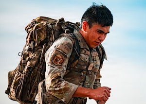 To earn the Norwegian Foot March badge, participants must finish the 18.64-mile event while carrying a 24.25-pound ruck and meeting time standards set by the Norwegian military.