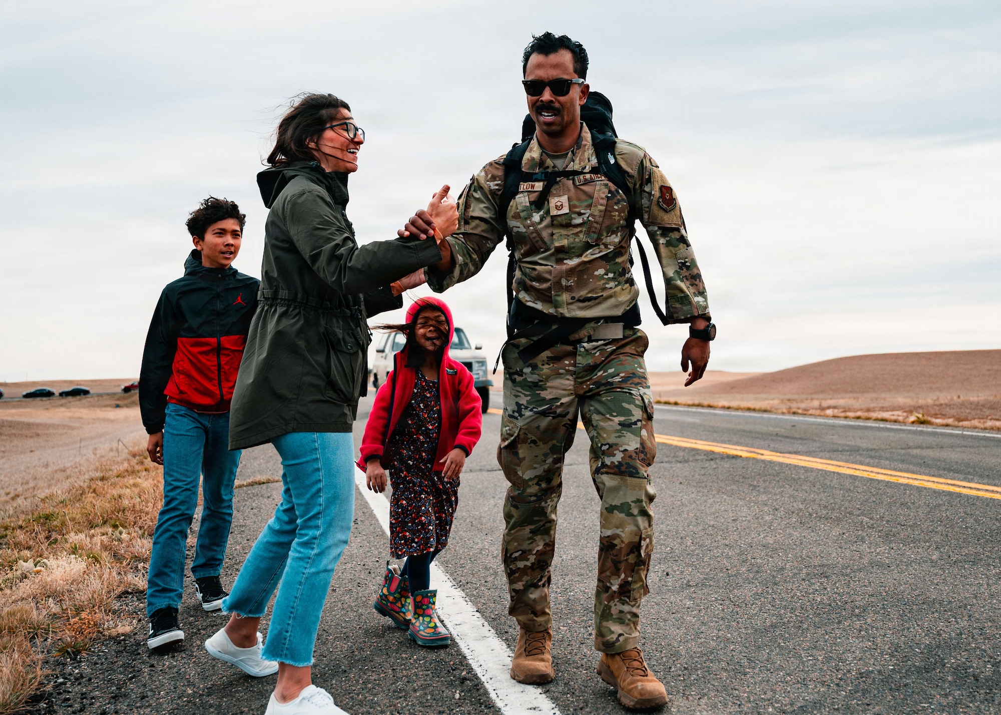 To earn the Norwegian Foot March badge, participants must finish the 18.64-mile event while carrying a 24.25-pound ruck and meeting time standards set by the Norwegian military.