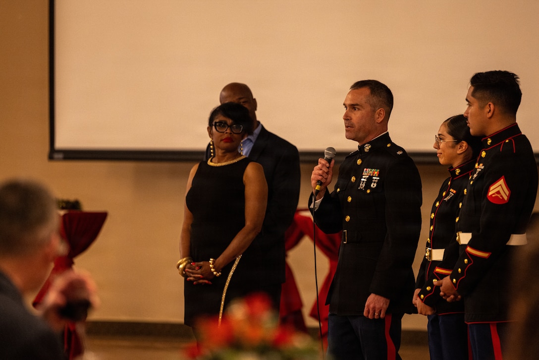 U.S. Marine Corps Lt. Col.  Kozick, the battalion inspector instructor with 4th Light Armored Reconnaissance Battalion, gives remarks about ‘Toys for Tots’ during the 2025 Holiday Buffet and Cocktail Reception at Marine Corps Base Camp Pendleton, California, Dec. 11, 2025. Brig. Gen. Brown hosted the event to kick off the holiday season and build camaraderie between MCIWEST and its surrounding units and organizations. (U.S. Marine Corps photo by Cpl.  Akamelu)